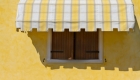 Benefits of Drop Arm Awnings