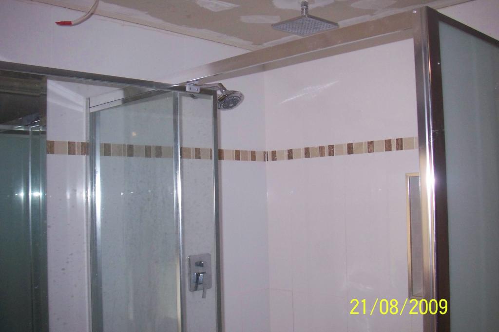 COMPLETED TILING WORK USING VARIOUS TILE TYPES AND SIZES