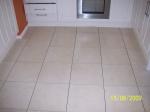 VARIOUS TILING WORK ON FLOORS AND WALLS