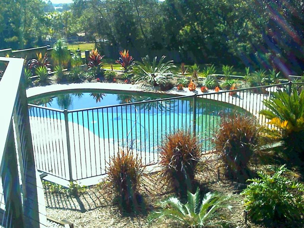 SWIMMING POOLS & DECKS