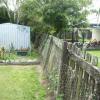 failed timber fence