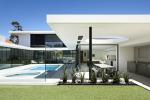 A sleek 1960s modernist ethos defines this family residence. 