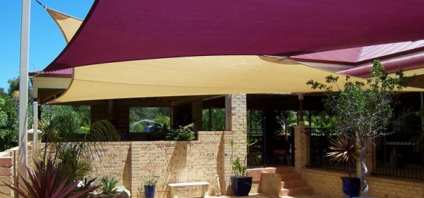 Creating shade with sails in the backyard